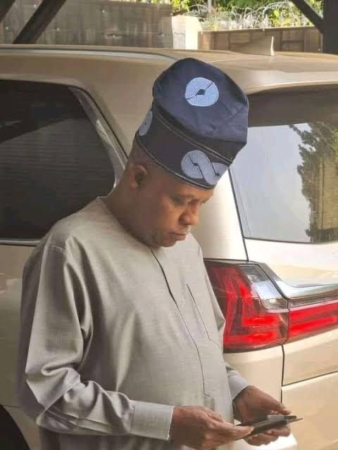 Kashim Shettima beside Lexus Lx 470