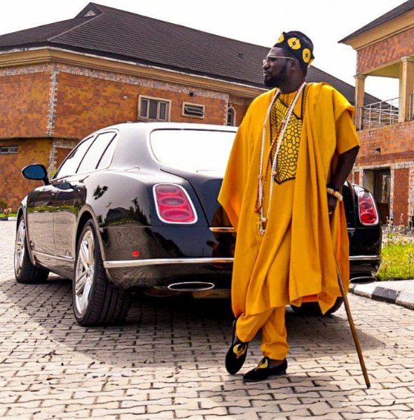 Chief Ayiri of Warri Next To His Bentley Mulsanne