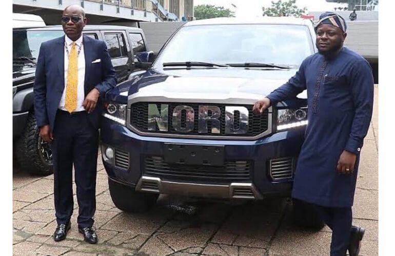 Oluwatobi Ajayi posing with Nord Tank